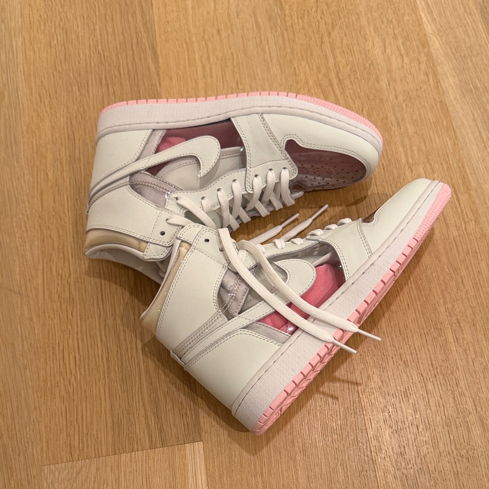 Stylish Pink and White High-Top Nike Sneakers